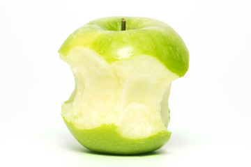 fully eaten green apple on white