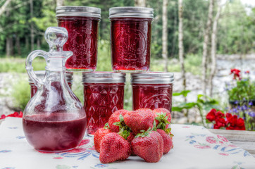 Homemade strawberry jelly and syrup