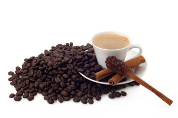 Cup of coffee and beans with sugar cinnamon stick