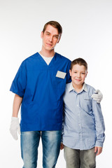 child to the doctor in blue robe