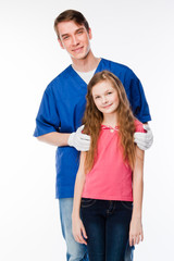 Obraz premium child to the doctor in blue robe