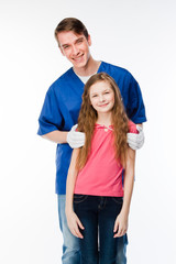 child to the doctor in blue robe