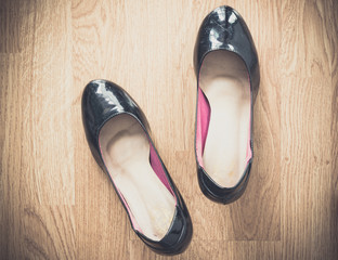 black shoes on wood background