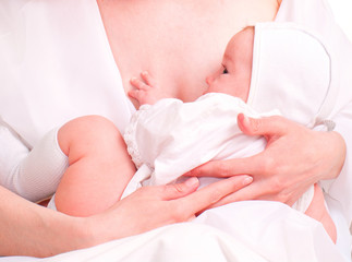 Portrait of baby on mother hands
