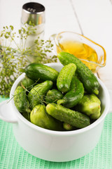 Fresh cucumbers on wooden background
