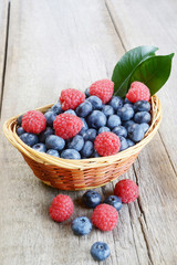 Berries on Wooden Background.