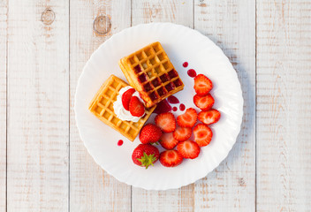 Fototapeta na wymiar Strawberries and wafer