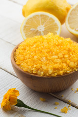 Sea salt in bowl  on wooden background