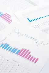 重ねたビジネス書類のアップ