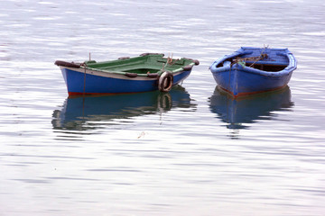 Fototapeta na wymiar two boats on water