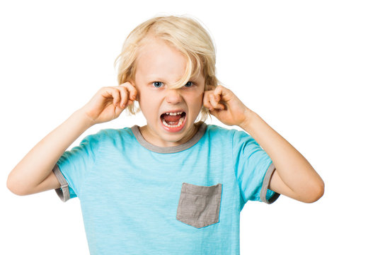 Boy screaming and blocking ears
