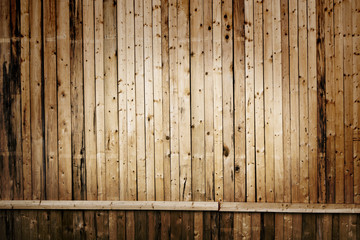 narrow vertical wooden planks with horizontal line as background