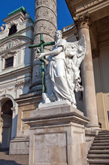 Obraz premium Statue of an angel in St. Charles Church. Vienna, Austria