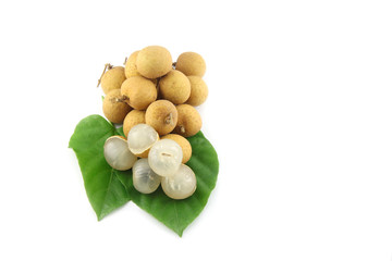 Longan resting on leaves.