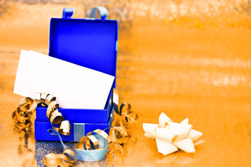 open present box on golden background