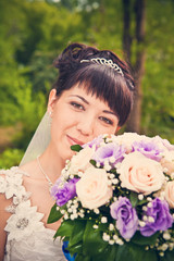 Obraz premium Portrait of a beautiful smiling bride