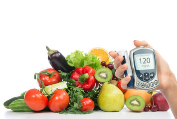 Diabetes concept glucose meter fruits and vegetables