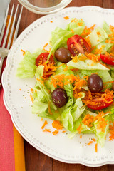 salad on the plate with white wine