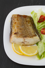 fried fish with salad