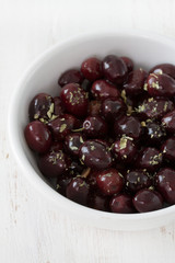 olives in white bowl