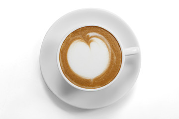 Top view of a coffee mug with latte art on white background