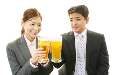 ビールを楽しむビジネスマンとＯＬ