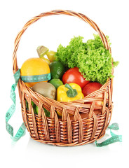 Fresh vegetables in wicker basket isolated on white