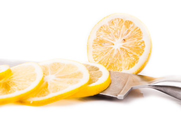 sliced yellow lemon isolated on white background