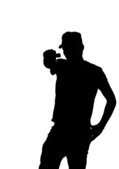 silhouette of a young male pointing gun.