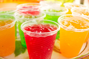 Soft drinks in plastic cups