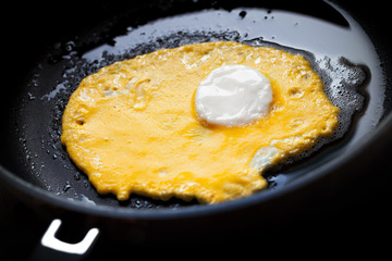 Roasted eggs with white center and yellow base