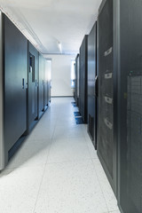 network server room with row of server racks