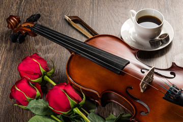 Fototapeta premium Violin, rose, coffee and music books