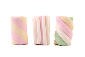 Three colourful marshmallow. Close up.