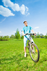 Fototapeta premium Cute man on the bike