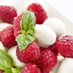 delicious raspberry salad with mozarella and basil