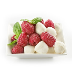 delicious raspberry salad with mozarella and basil