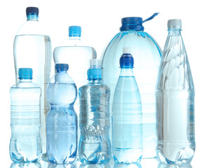 Different water bottles isolated on white