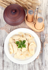 Tasty dumplings with fried onion
