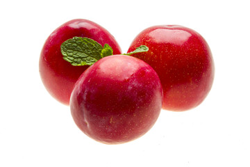 Bright ripe plum with mint