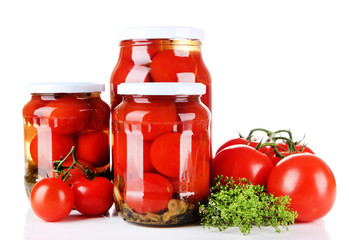 Fototapeta na wymiar Tasty canned and fresh tomatoes, isolated on white