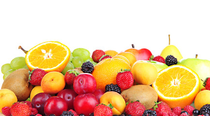 Fresh fruits and berries isolated on white