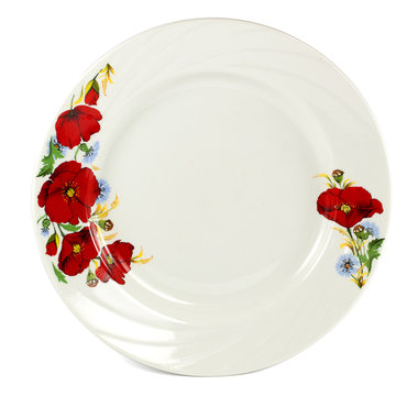 White plate with red poppies