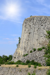 Tall sharp cliff shooted in sunny day