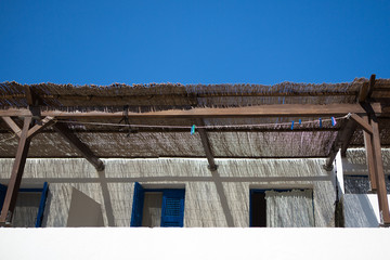 Fototapeta na wymiar Typical traditional white and blue facades