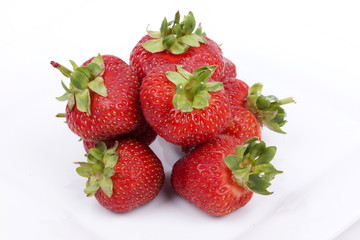 Strawberry fruits on white background