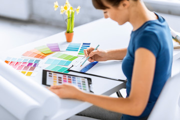 woman working with color samples for selection