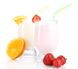 Delicious milk shakes with orange and strawberries isolated