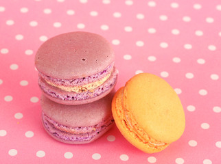Gentle macaroons on pink background