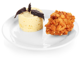 Chicken Kiev  and mashed potatoes on plate, isolated on white